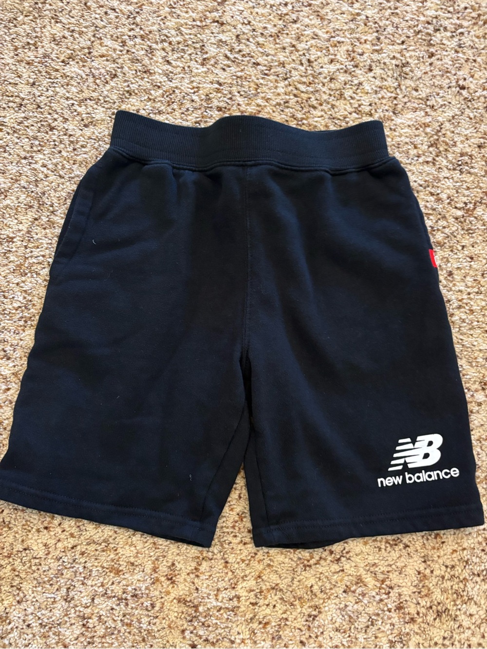 New Balance Black Athletic Shorts with White Logo Tag